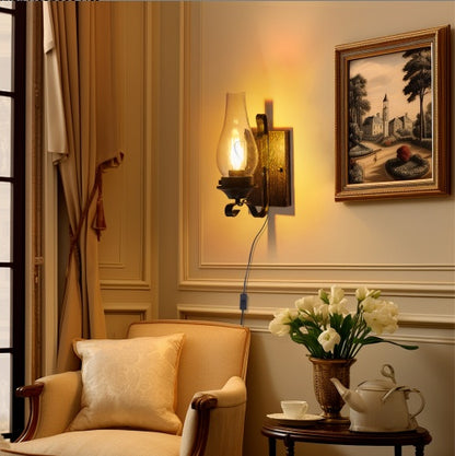 Aldridge plug-in wall sconce, clear glass chimney shade on a hand-painted black and gold base, alternate view 2