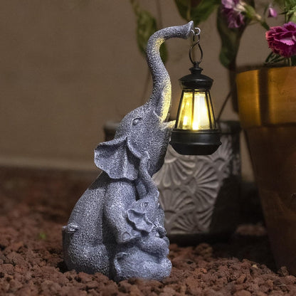 Hand-painted resin elephant figure holding a solar lantern, alternate view 7