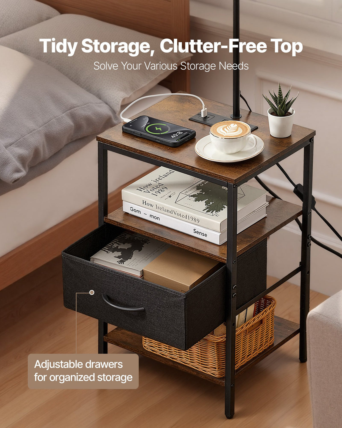 Fabric drawer pulled open on the floor lamp side table, holding books and boxes, with an open shelf above and a basket on the lower shelf