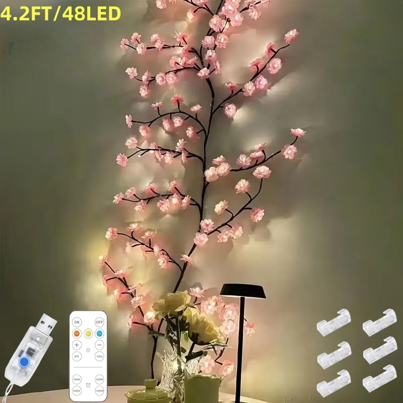 Cherry blossom tree branch lights with pink LED blossoms on bendable brown branches, USB powered, alternate view 1