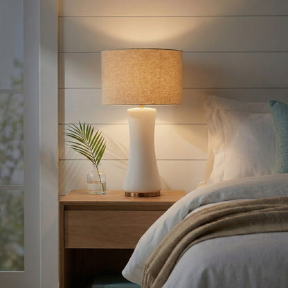 Lennox cascade glass table lamp, off-white glass body on a brushed gold base under an off-white drum shade