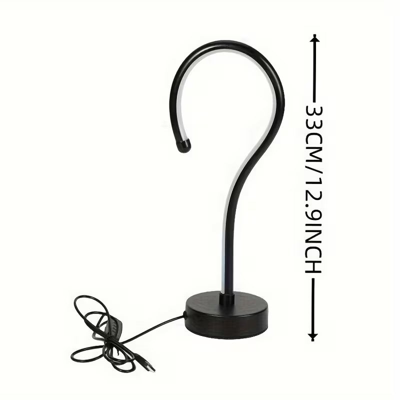 Quill question mark table lamp with curved acrylic tube on a black base, alternate view 3