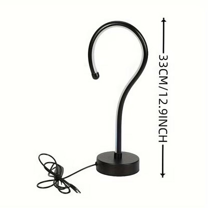 Quill question mark table lamp with curved acrylic tube on a black base, alternate view 3