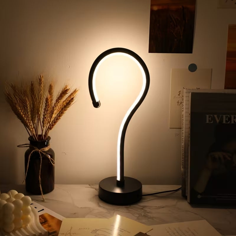 Quill question mark table lamp with curved acrylic tube on a black base, alternate view 4