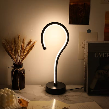 Quill question mark table lamp with curved acrylic tube on a black base, alternate view 4