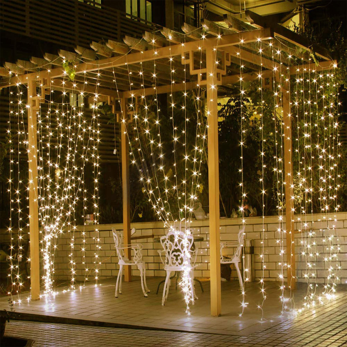 Curtain string lights — a 9.8 ft curtain of 300 warm white LEDs on twelve hanging strands