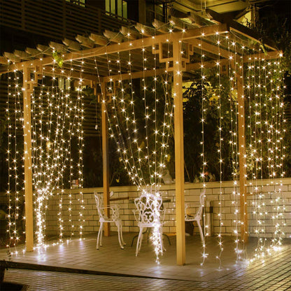 Curtain string lights — a 9.8 ft curtain of 300 warm white LEDs on twelve hanging strands