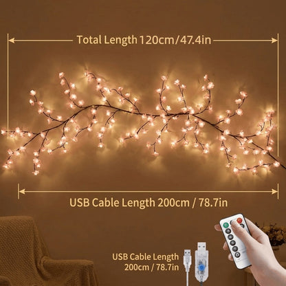 Cherry blossom LED branch vine lights shaped against a wall, alternate view 9