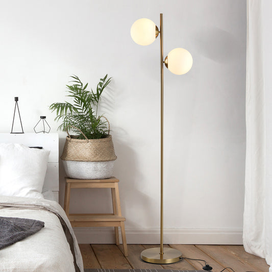 Ellery two-globe floor lamp with white glass globe shades on a gold-tone pole and round base