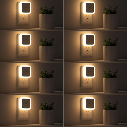 Plug-in dusk to dawn LED night light in white, shown in a wall outlet, sold as a pack of eight