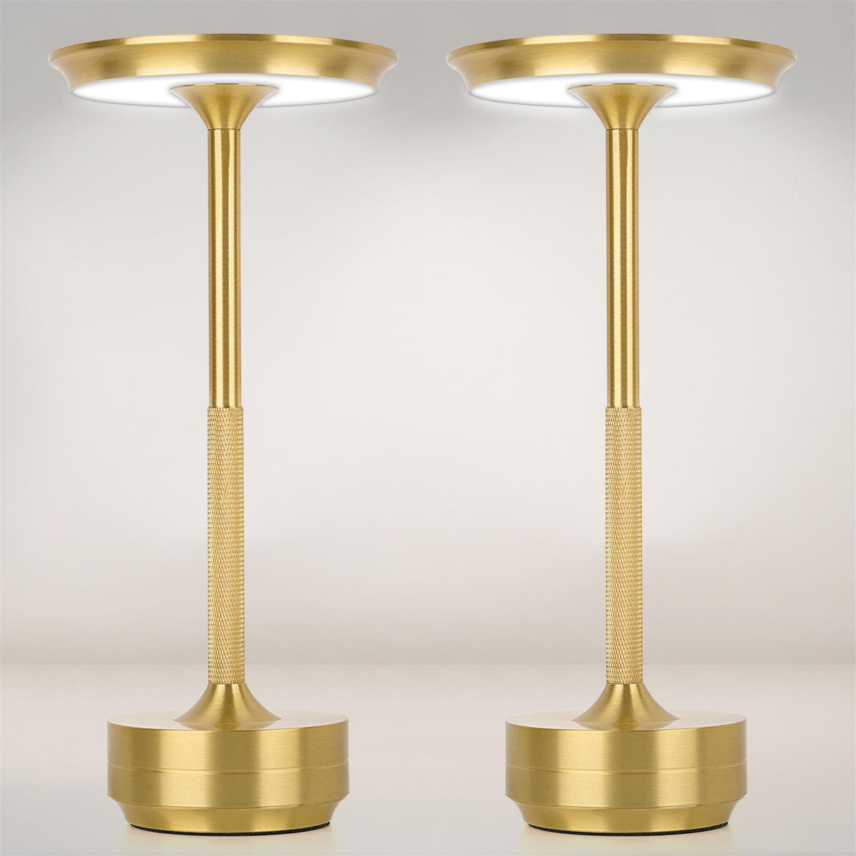 Fairlane cordless table lamps in brushed gold aluminium with disc-shaped shades, sold as a set of two