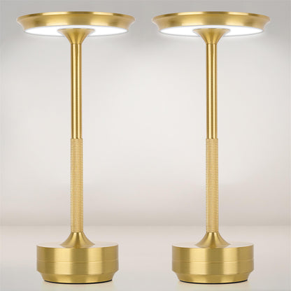 Fairlane cordless table lamps in brushed gold aluminium with disc-shaped shades, sold as a set of two